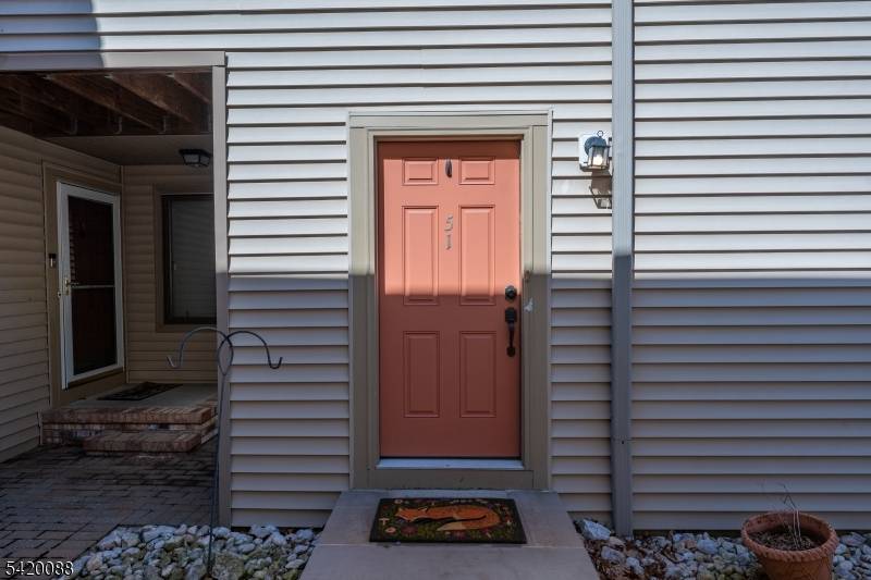 Located in the highly sought after Sunrise at Hanover community, this second floor 2 bedroom 2 bath end unit needs some work and the price reflects that.