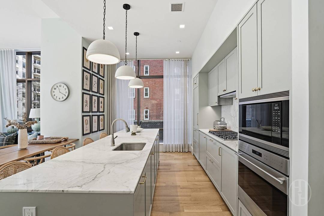Set in one of Manhattan s most sought after neighborhoods, this exceptional corner two bedroom, two and a half bathroom residence seamlessly combines refined design, comfort, and contemporary luxury.