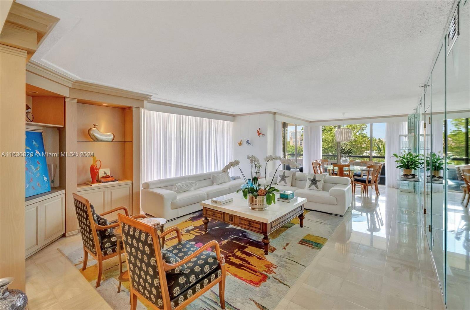 Enter and be wowed by this Fabulous Corner Unit In Turnberry Isle South Tower With Oversized Wrapround Terrace.