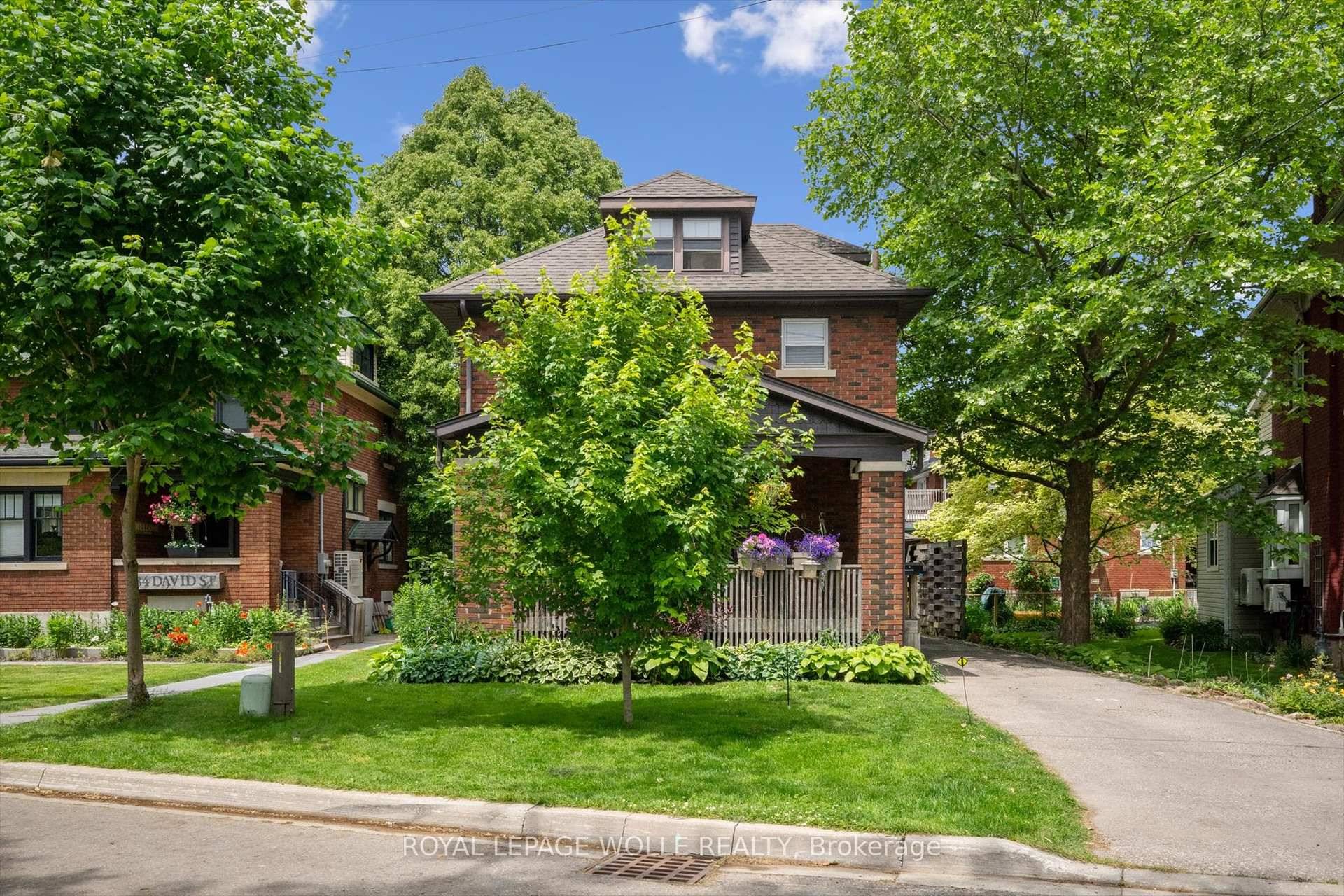 Nestled in the sought after Victoria Park neighbourhood, this all brick century home seamlessly blends timeless character with extensive modern updates.