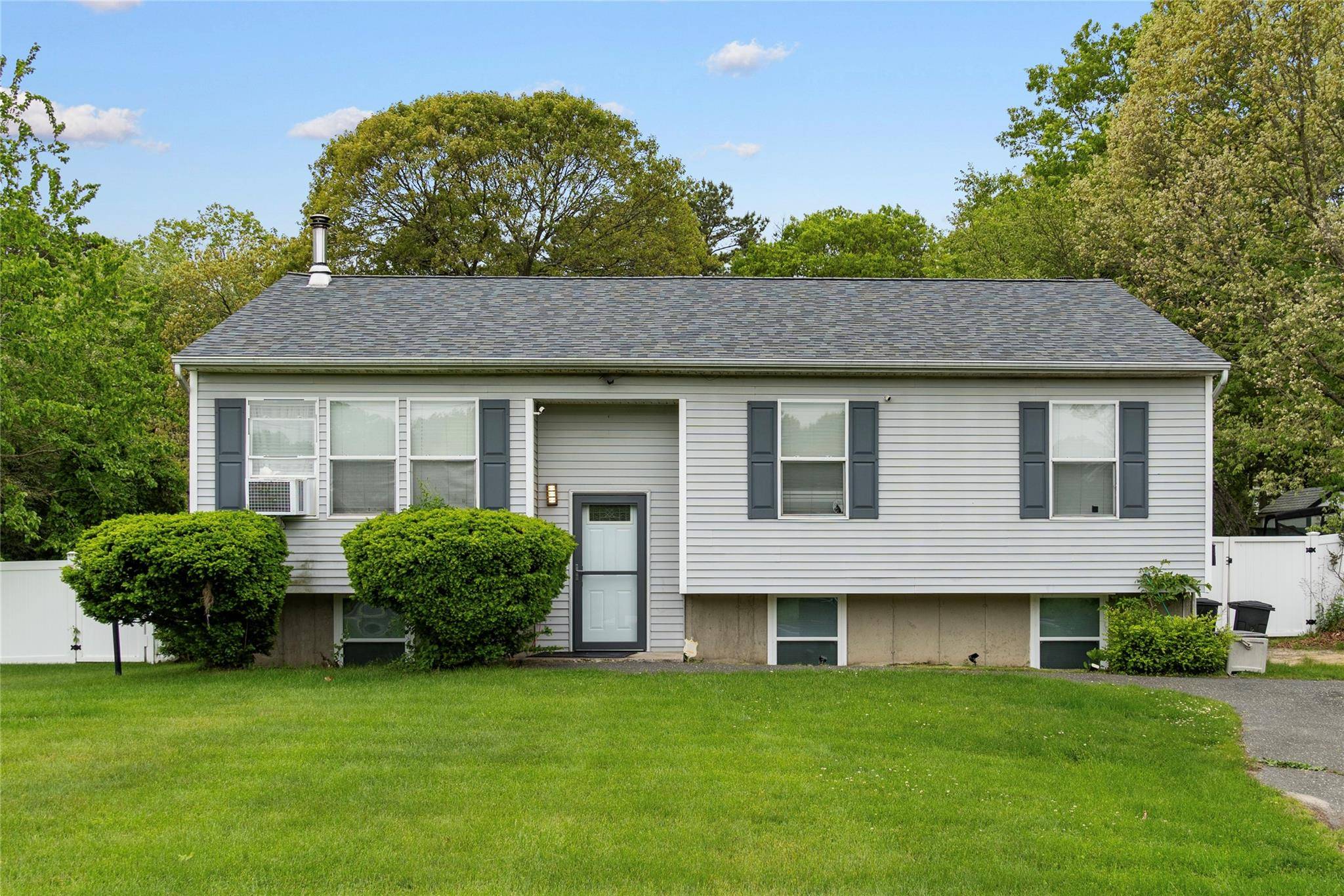 Discover this 3 bedroom, 2 bathroom raised ranch in East Patchogue, situated on nearly half an acre.