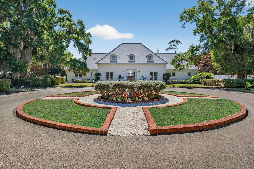 Tucked along prestigious Doctor's Row just minutes from the beach, this ''unicorn'' Vero Beach estate offers the privacy and flexibility of a true coastal compound without HOA restrictions.