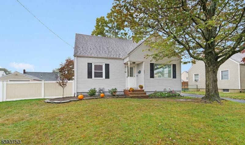 Move in Ready Cape Cod on a Tree Lined Street !