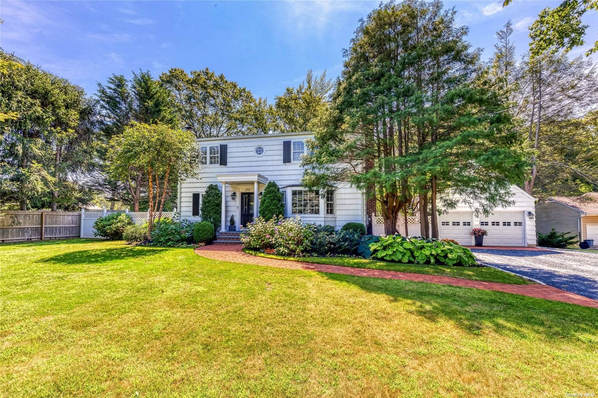 Charming four bedroom, three bath colonial set back from the road on more than half an acre of professionally landscaped flat property with specimen plantings, beautiful inground pool, patio area, ...