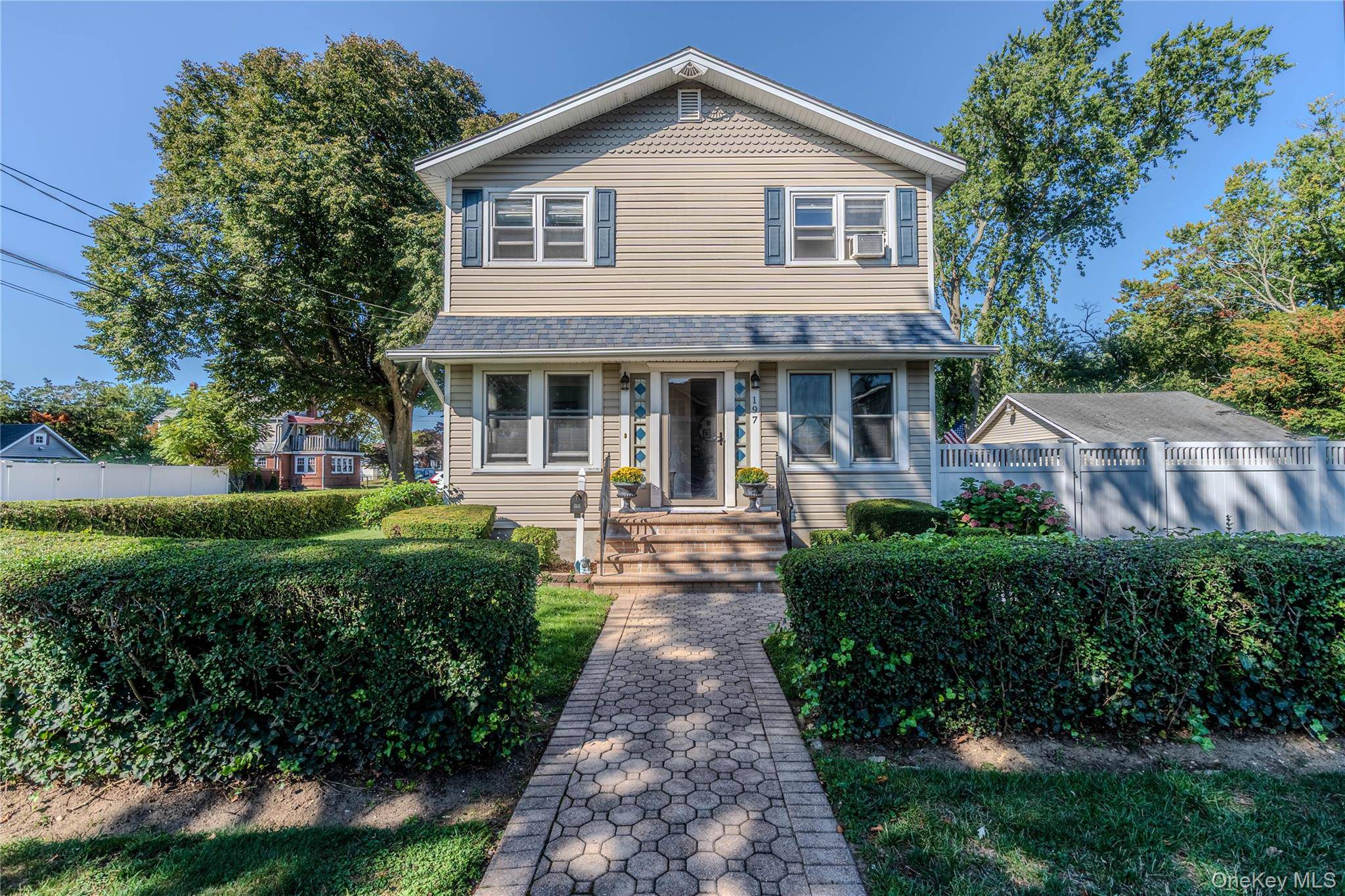 This single family VICTORIAN COLONIAL beauty has it all !