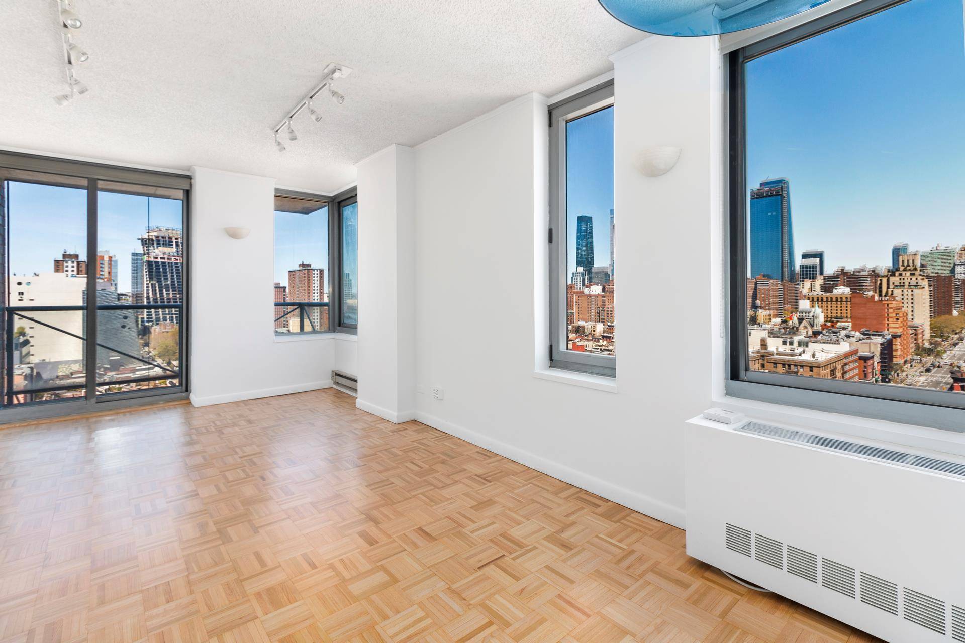 VIEW VIEW VIEW ! ! ! This corner high floor sun blasted 1 bed 1 bath with private balcony in the ultra hip Chelsea Meatpacking is a rare gem.