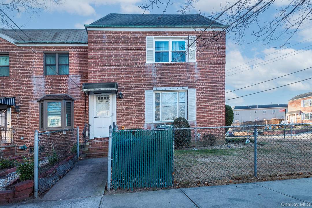 Bright and sunny, semi detached two family brick home in the heart of Bellerose !