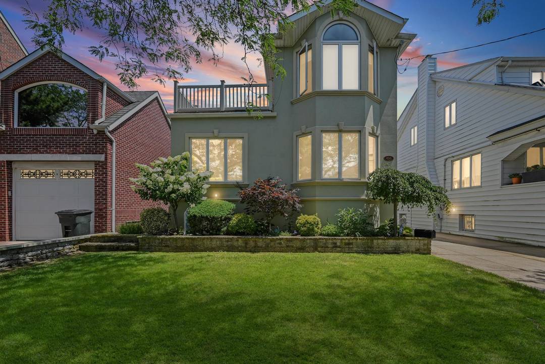 Welcome to your new home nestled in the serene neighborhood of Neponsit.