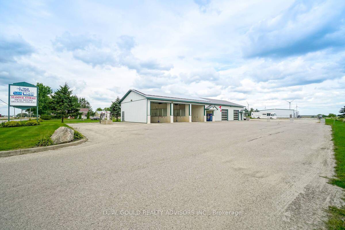 This property offers County Road exposure and features a total of 14, 018 sf of building area on 2.