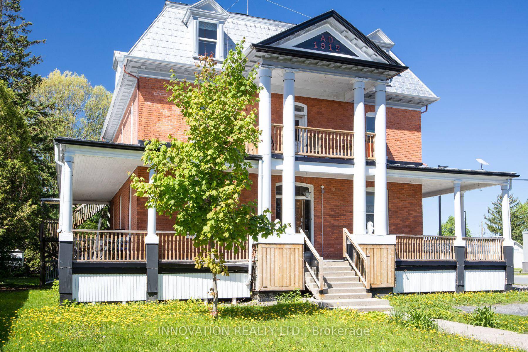 Step into a piece of living history with this remarkable 1912 Victorian residence, a rare architectural gem that beautifully blends historic charm with modern investment potential.