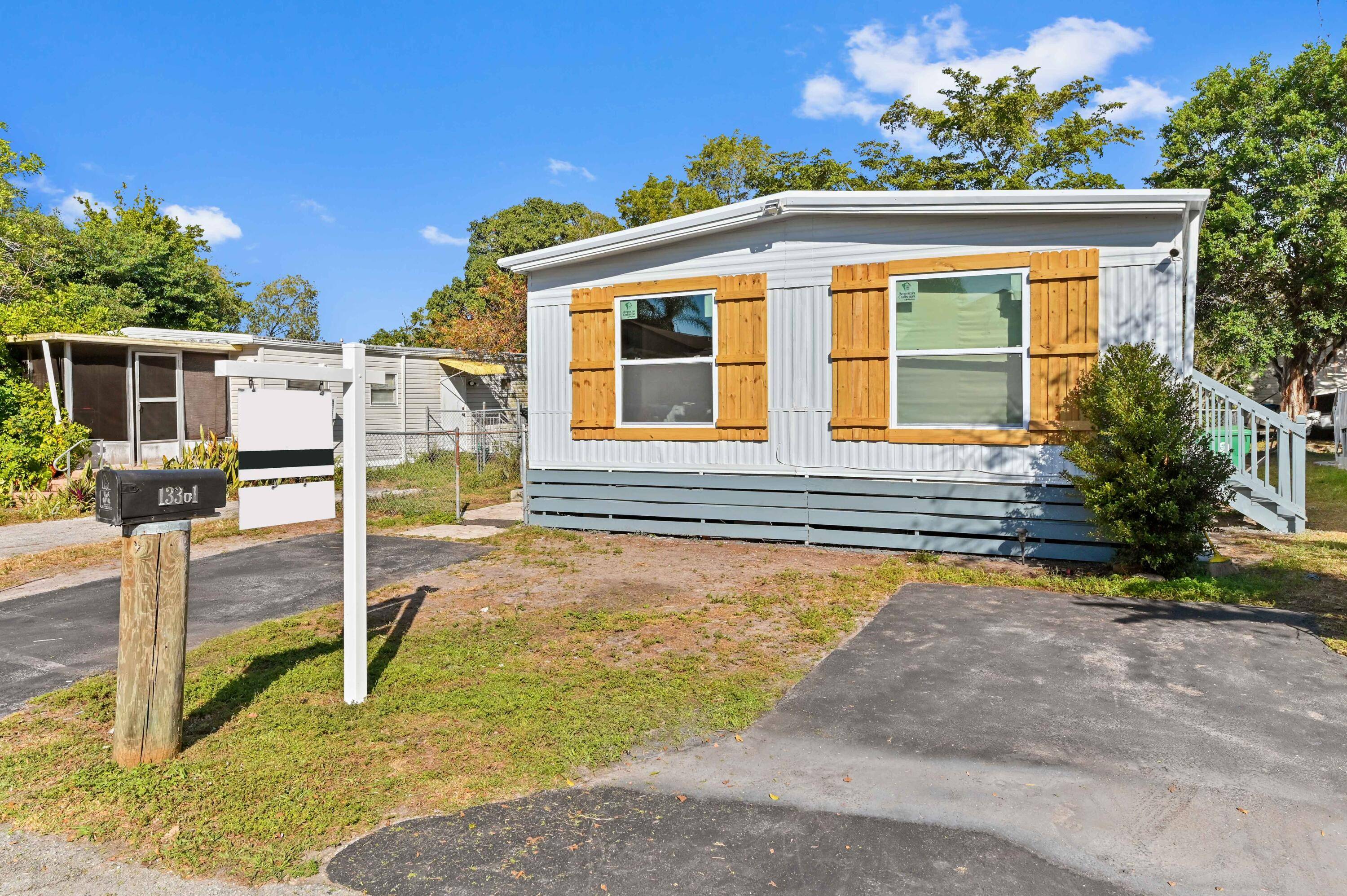 Discover the perfect blend of charm and modern updates in this delightful 4 bedroom, 2 bathroom manufactured home located in the non HOA community of Orange Park, Davie.