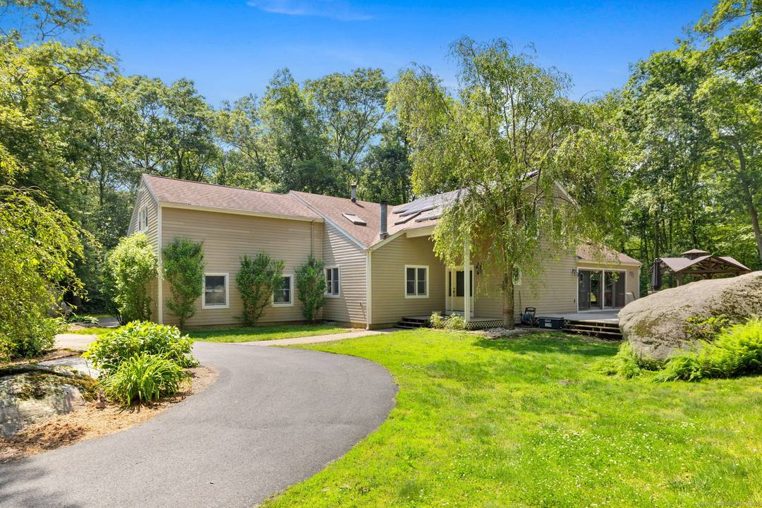 Discover a serene 2. 1 acre retreat in the heart of Mystic, where modern luxury meets tranquil privacy.