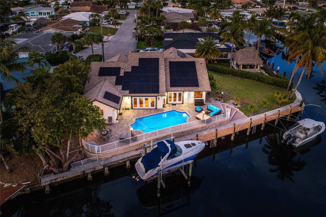 Pompano Beach is the place to be, offering a rare chance to own a spacious waterfront home with a newer seawall, home mostly rebuilt in 2006 after a hurricane.