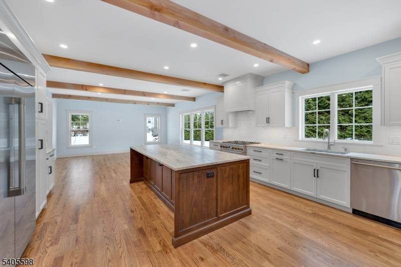 Unparalleled all new construction designed for today's lifestyle and set on a quiet double cul de sac buffered by wooded views !