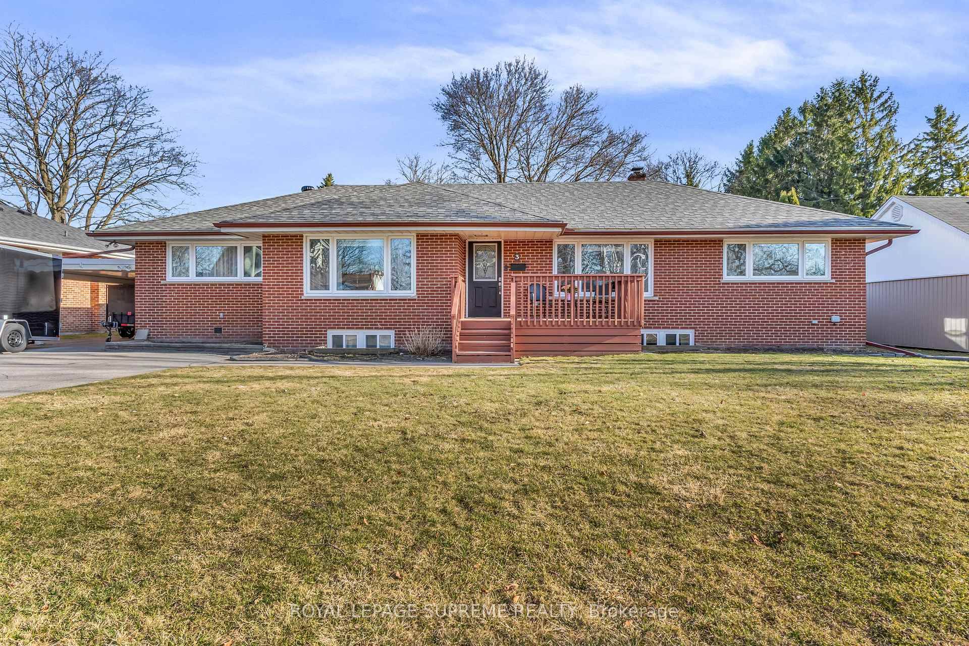 This charming ranch style bungalow sits on a sprawling 84' x 150' lot, surrounded by mature trees in a welcoming neighborhood.