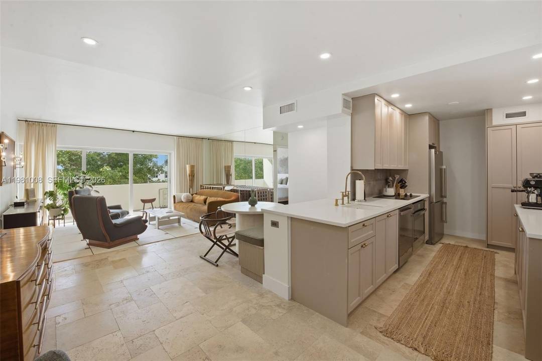 Residence 6K at 3 Island Avenue captures the essence of classic Miami Beach sophistication in one of Belle Isle s most iconic Morris Lapidus designed buildings.