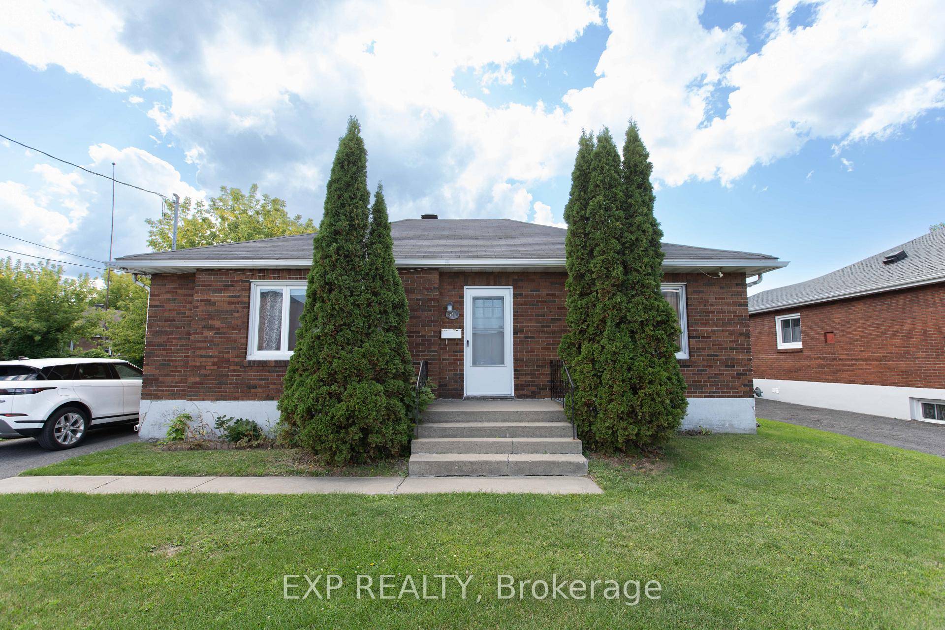 Welcome to 501 McConnell Ave, a well kept brick bungalow offering comfort and convenience in a great central location.