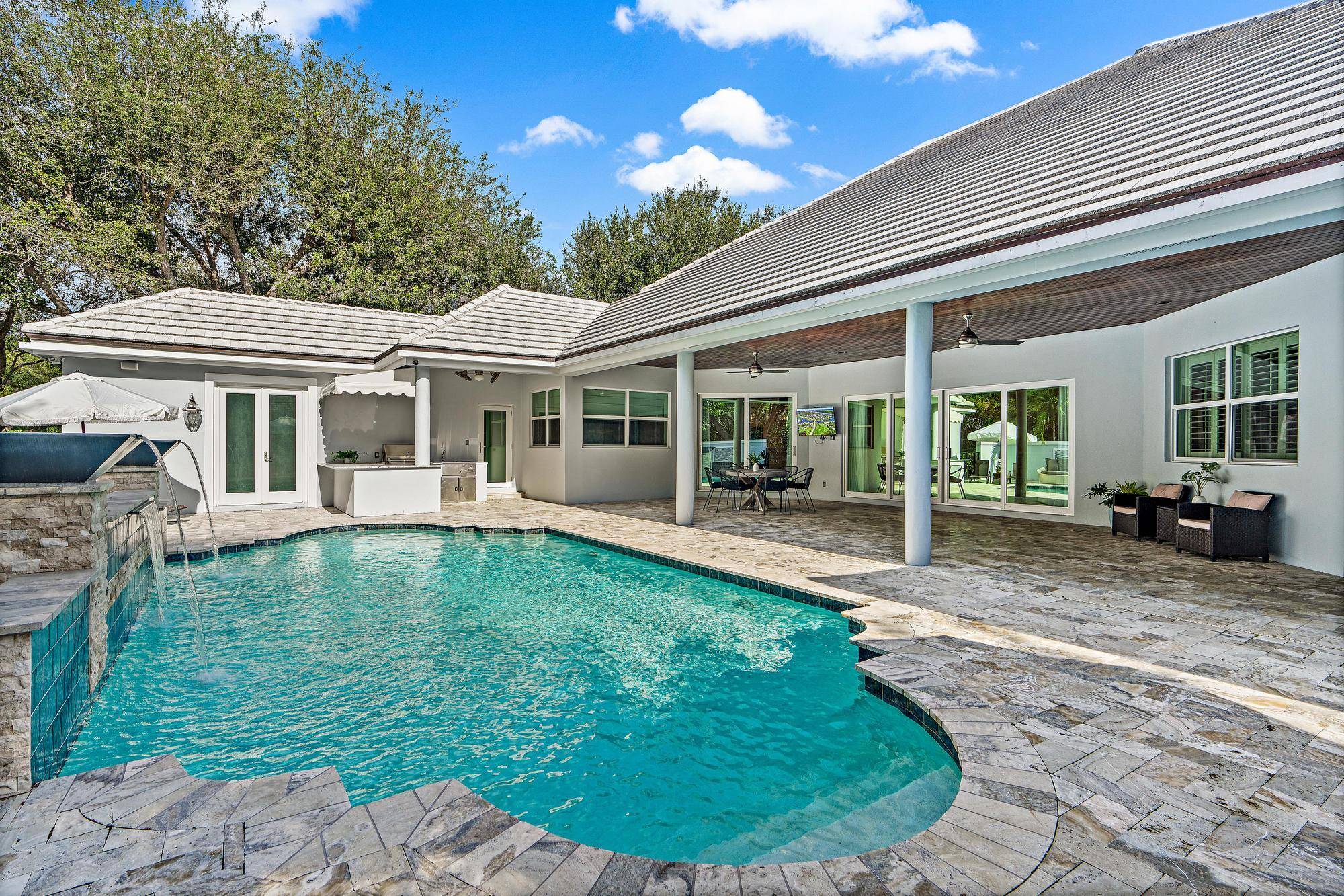 Welcome to 12375 Ridge Road in the exclusive Seminole Landing community of North Palm Beach.