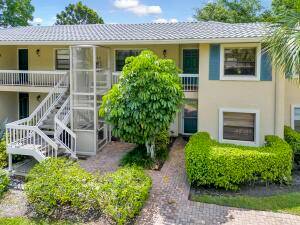 This two bedroom, two bath waterfront condominium offers 1, 661 square feet of living space across two floors in the Westgate community of Boynton Beach.