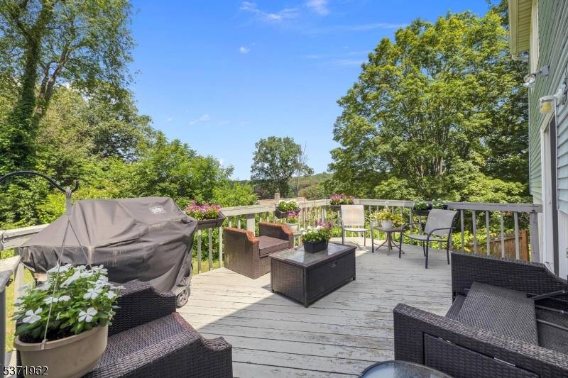 Custom Home with Space, Privacy Endless Potential Privately set on a scenic lot with mountain views, this custom bilevel home offers incredible square footage, a flexible layout, and plenty of ...
