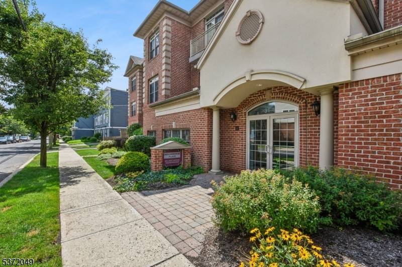 Welcome to 31 41 Chrch St, Unit 306 a rare opportunity to own a sun filled, top floor corner unit in one of South Orange's most boutique buildings.
