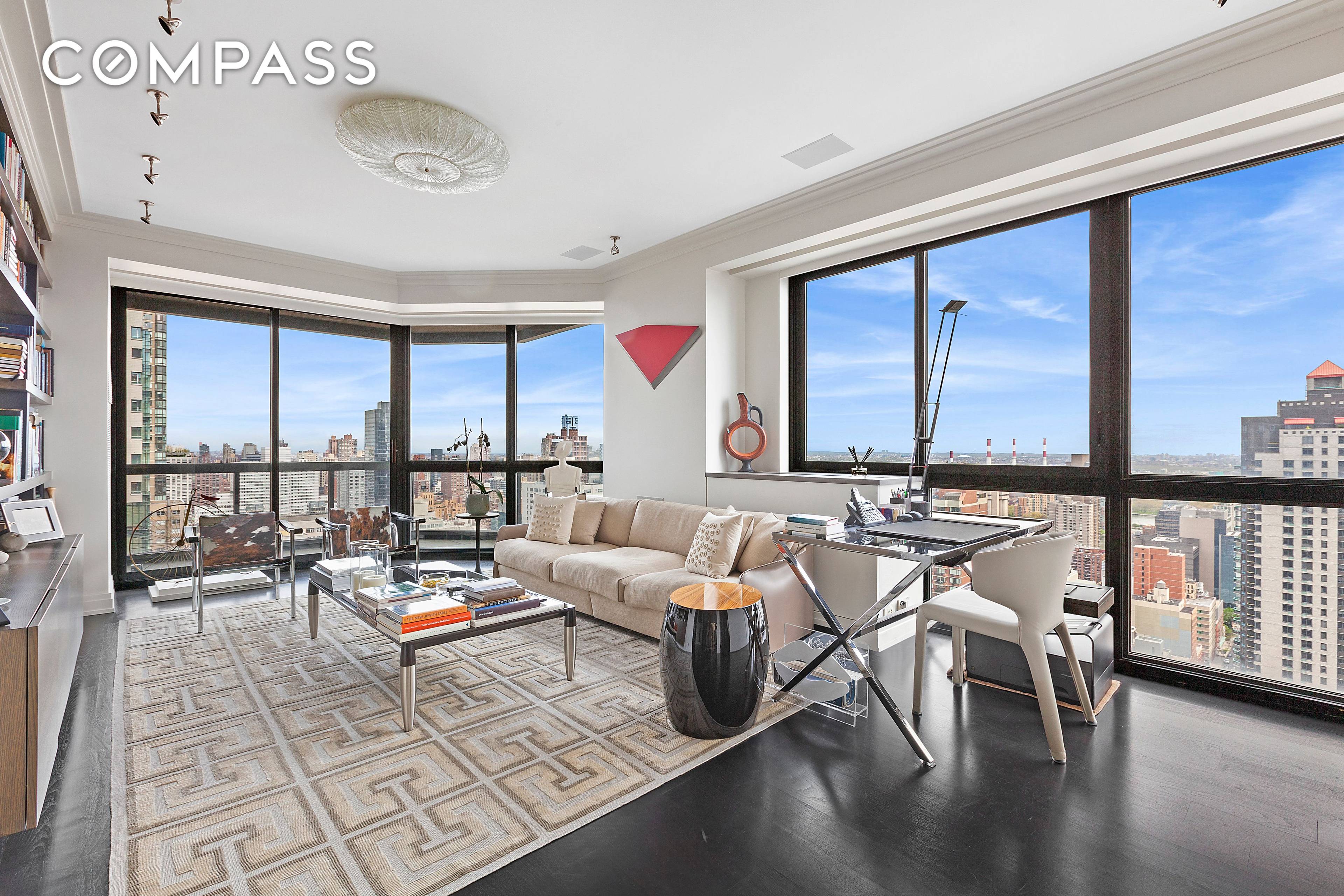 Welcome to this glamorous, designer duplex in the sky with sweeping panoramic views and multiple balconies 3 that will set your heart a flutter.