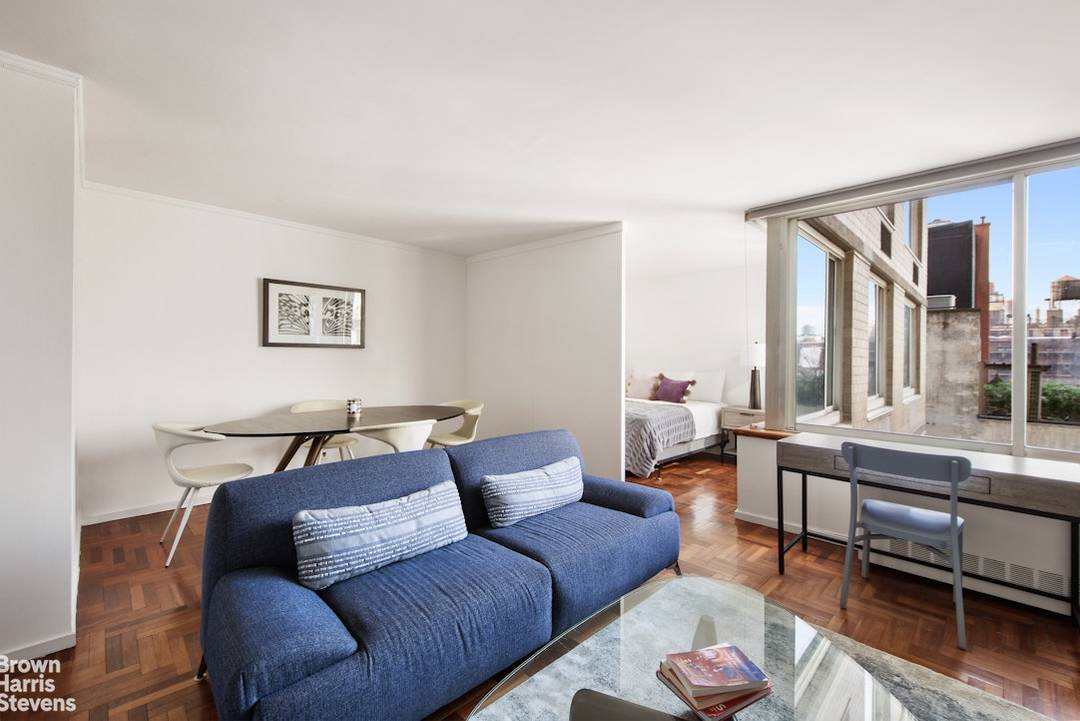 Spacious, high floor, alcove studio with separate sleeping area carved out with a pressurized wall for privacy and sleeping.