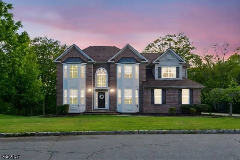 Welcome to your dream home in Mount Olive's prestigious Oak Hill !