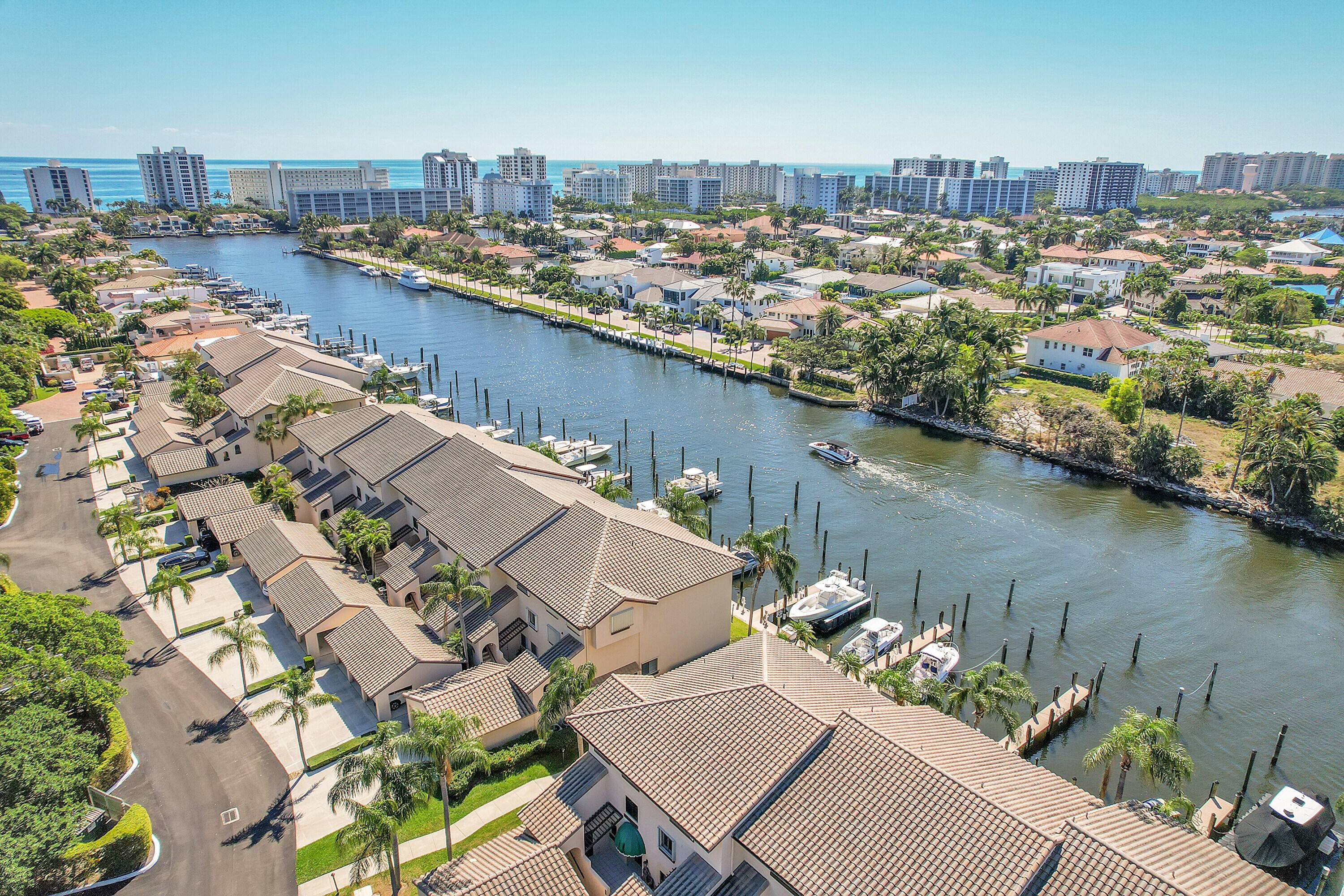 Step into turnkey waterfront luxury in Pelican Harbor's Captain's Walk with this fully remodeled 2 bedroom, 2.