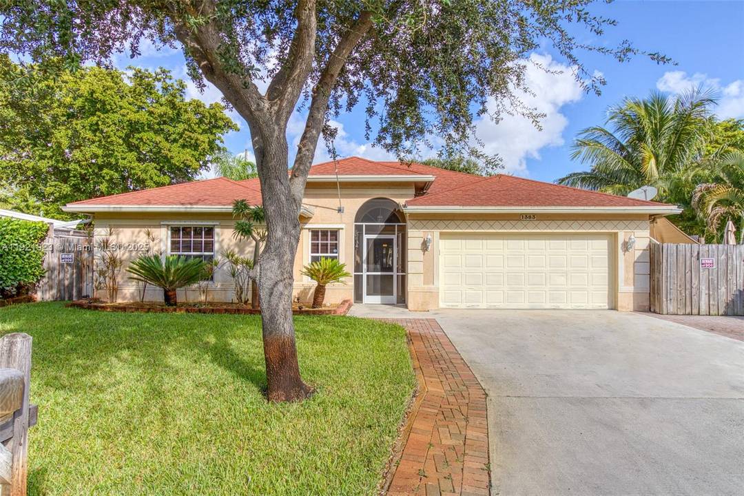 Built in 2005, this pristine condition 3BR 2BA in East Pompano features high ceilings, a smart open layout, and a climate controlled oversized 2 car garage.