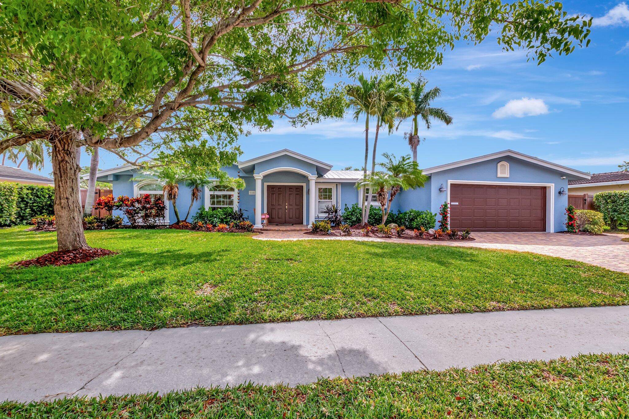 Welcome to this beautifully reimagined waterfront residence in the sought after community of Royal Oak Hills.
