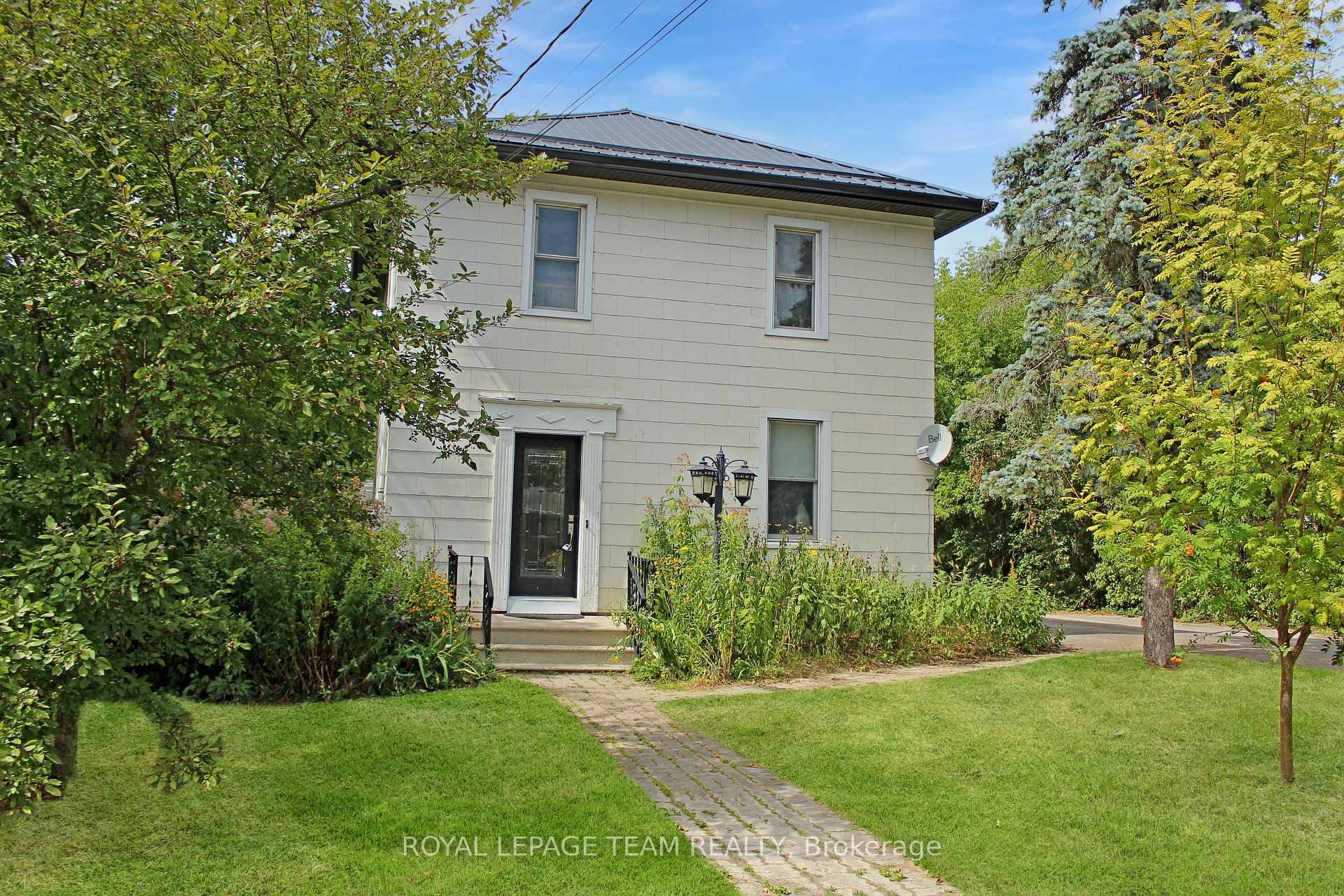 Welcome to one of the largest residential lots in town, sitting on an impressive 0.