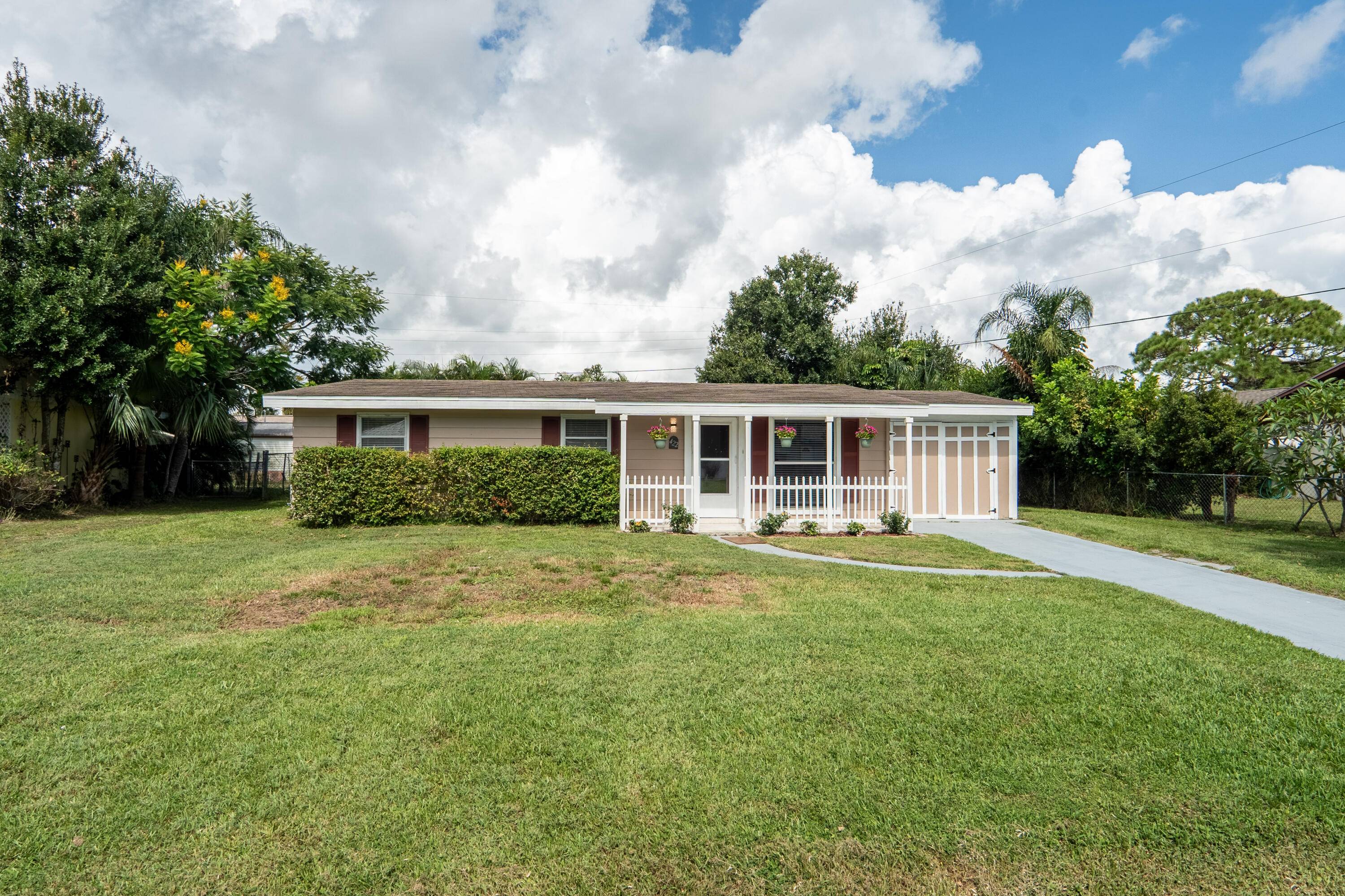 Great starter home featuring 3 bedrooms and 2 bathrooms on a spacious lot in a quiet, established neighborhood.