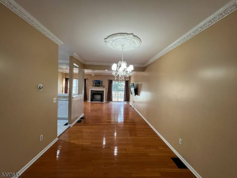 Welcome to this beautifully maintained home in the highly desirable Mazda Brook community, known for its low HOA fees and easy commute to the city.