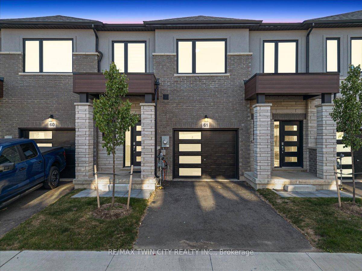Welcome to this modern style beautiful 3 bedroom town with lots of upgrades and nestled in an upscale community.