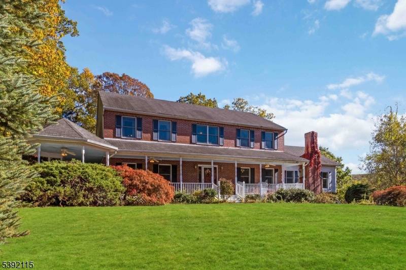 Lakefront Colonial with Breathtaking Mountain Views !