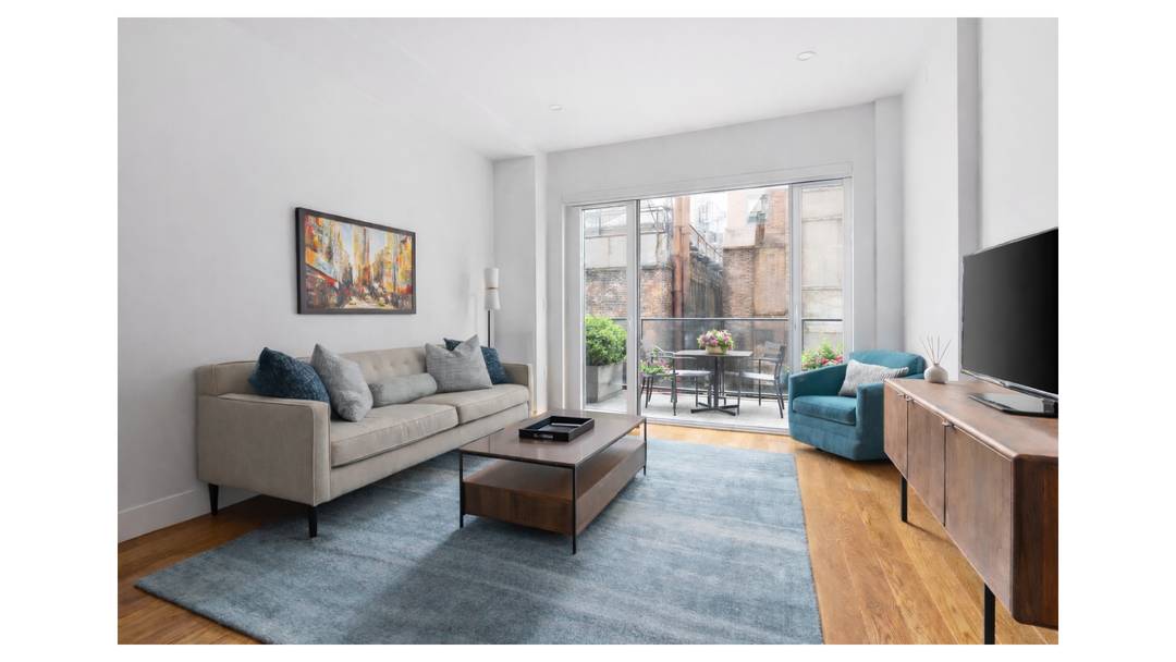 Residence 4C is a beautifully designed corner one bedroom, one bathroom home filled with natural light.