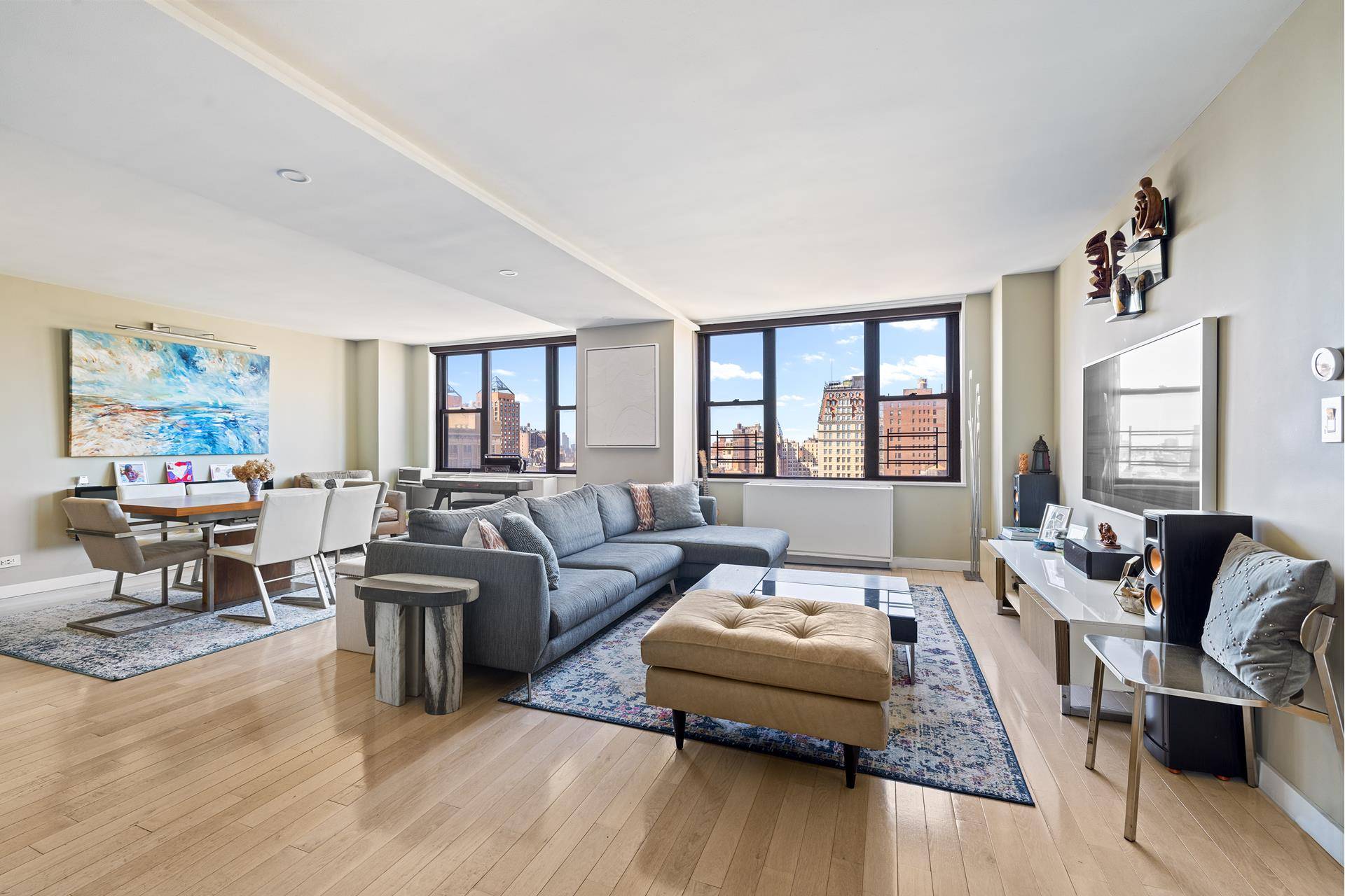 Truly deserving of its 'triple mint' description, this beautifully and tastefully gut renovated combined apartment is flooded with light throughout and offers incredible sunset views of Hudson Yards, the Empire ...