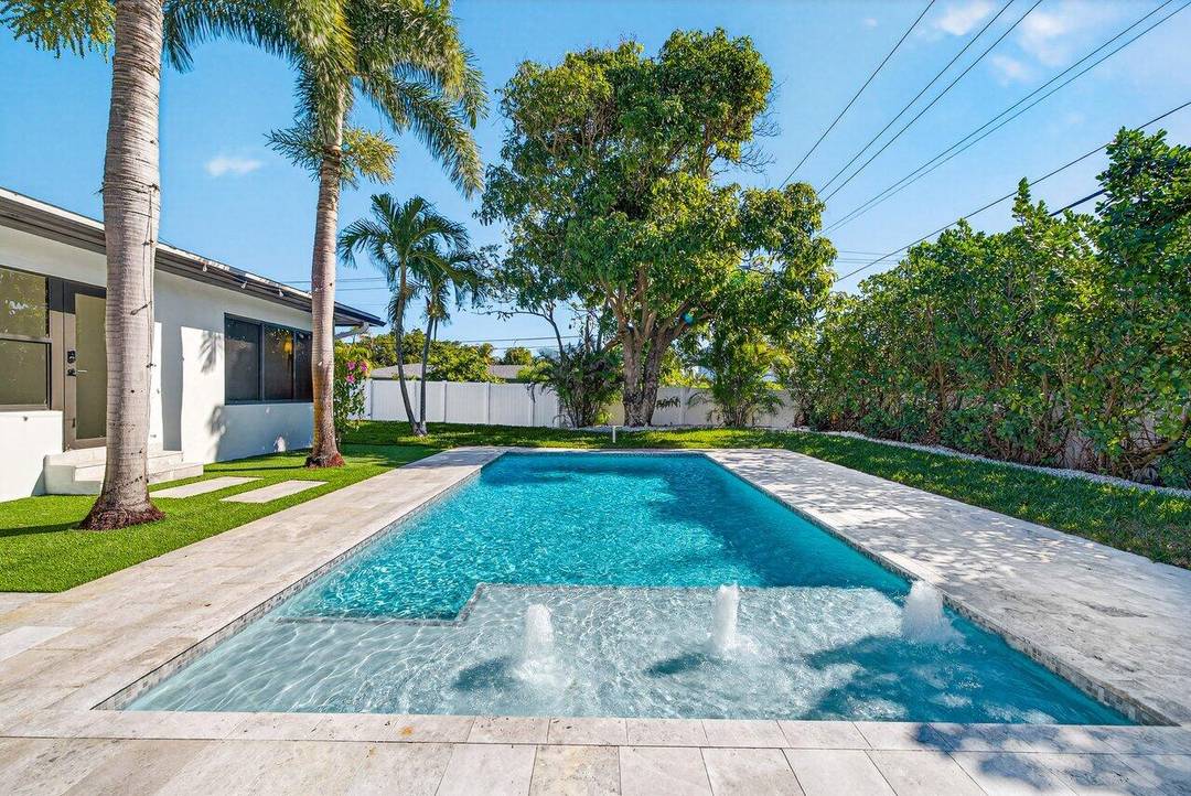 Welcome to 1004 Avon Road, a completely renovated 2025 residence offering the feel of new construction in the heart of Pineapple Park, West Palm Beach.