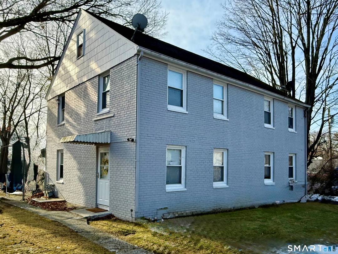 This solid brick duplex offers an excellent chance for homeowners or investors seeking long term value.