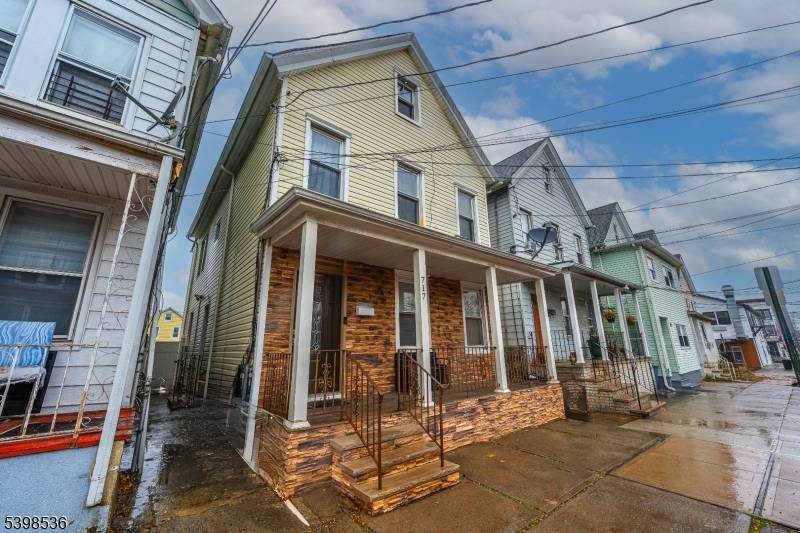 This multifamily home offers an excellent location with convenient access to the NJ Turnpike, Route 1 9, and the Verrazano Bridge.