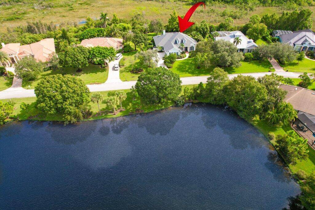 This Windstone estate presents 4 bdrms plus private office across almost 4, 000 total sqft set on over half an acre.