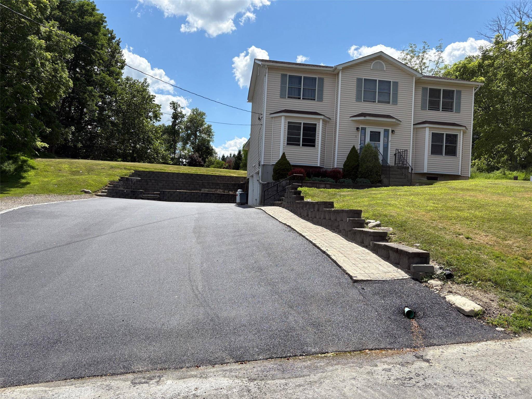Brand new oversized driveway.