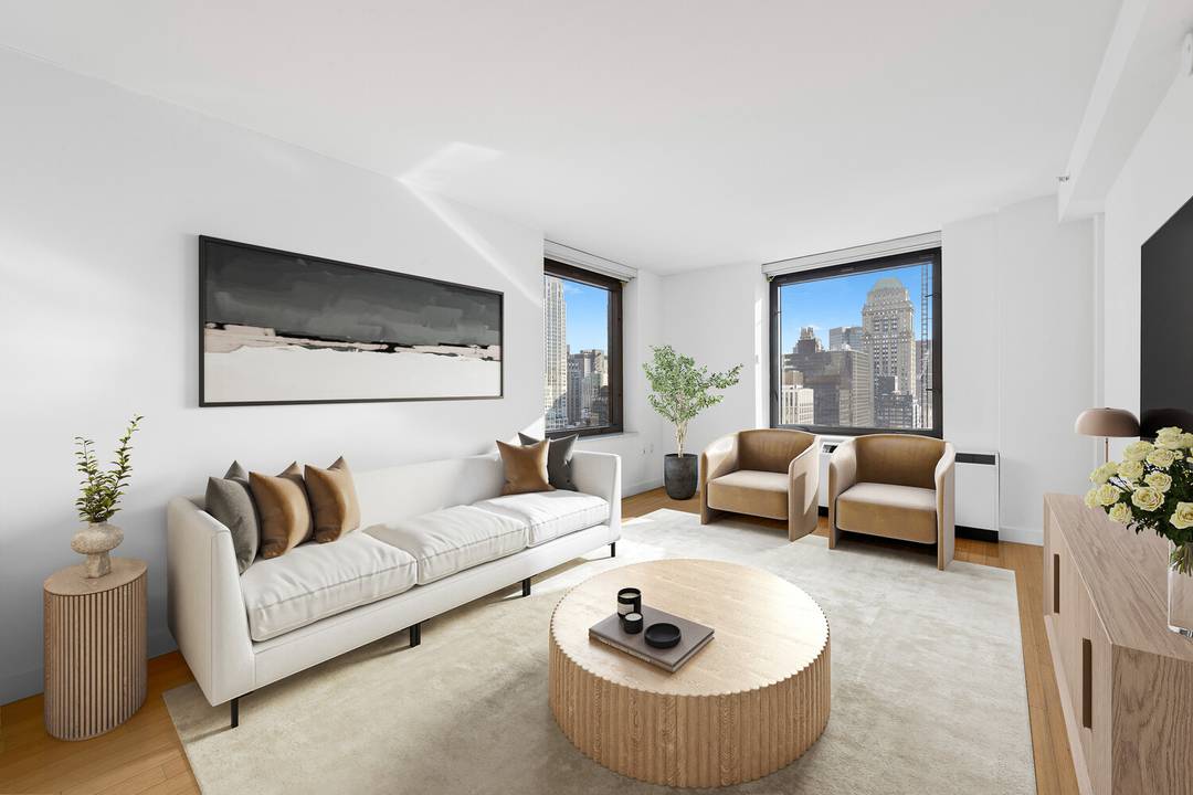 Sun Filled Corner One Bedroom a den with Iconic Midtown Views High above Midtown, Residence 40E in the Bryant Park Tower is a bright corner true one bedroom wrapped in ...