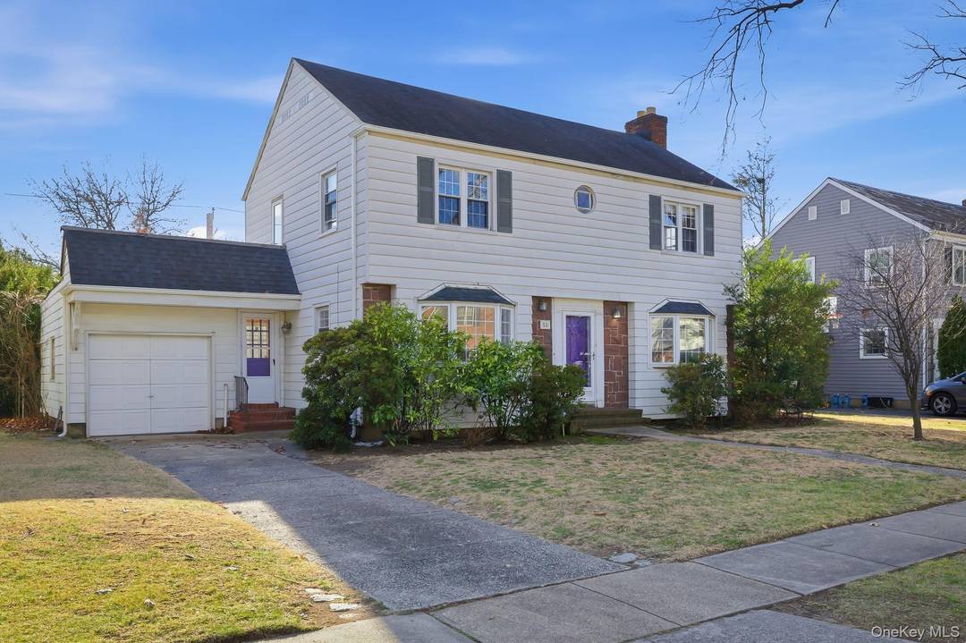Welcome to this Beautiful Center Hall Colonial, Located on a quiet tree lined street.