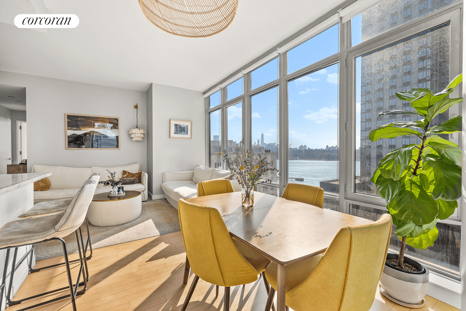 Sunset and city views from every room in this bright 1133 SF waterfront home.