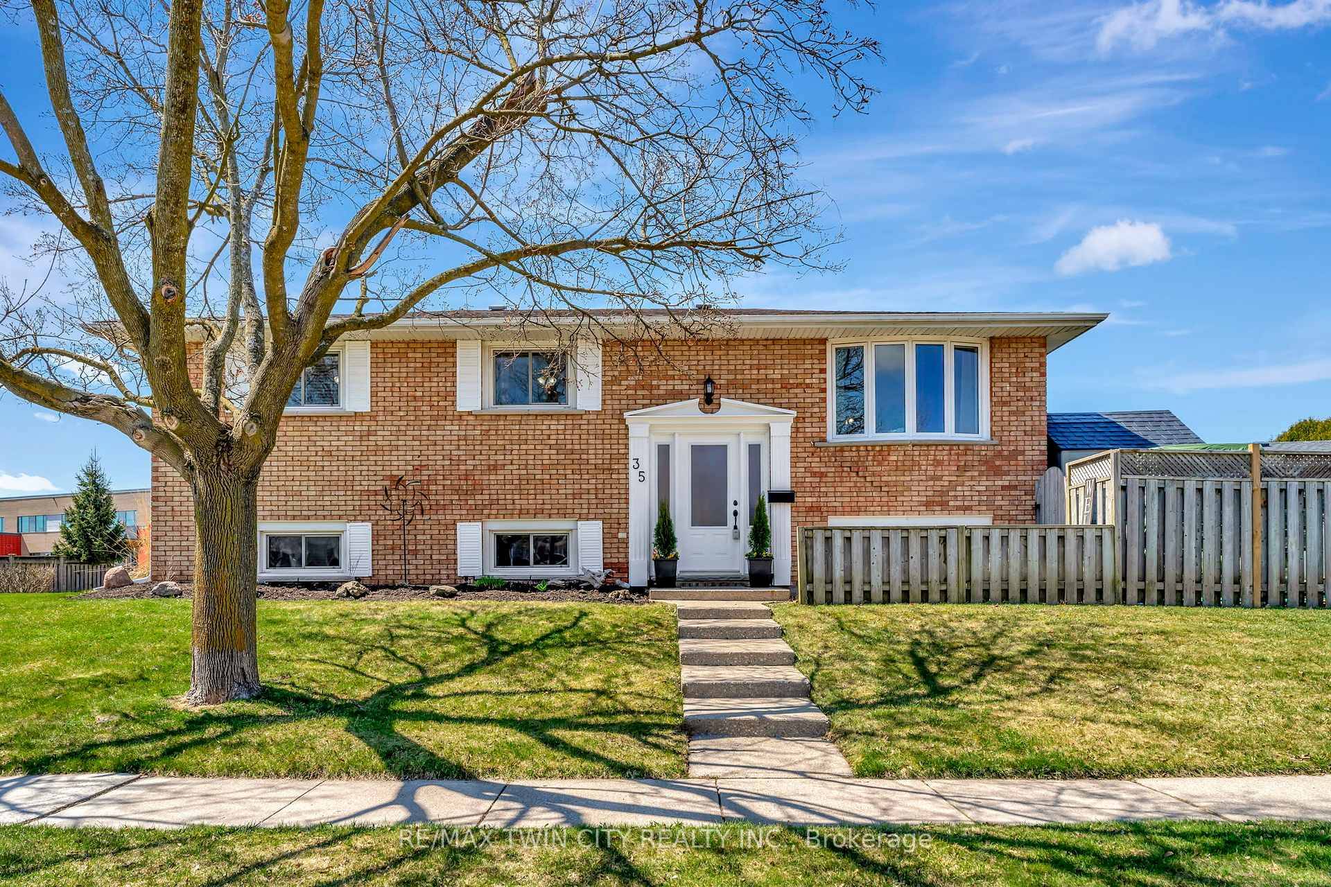 Welcome to this well maintained 3 1 bed, 2 bath raised brick bungalow on a large corner lot across from St.