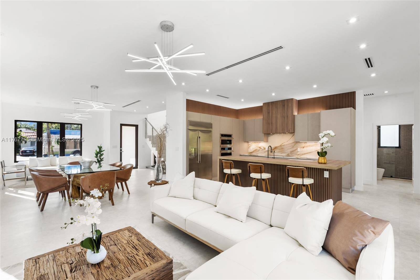 Presenting a stunning newly built residence in the prestigious City of Coral Gables, just completed and ready for immediate occupancy.