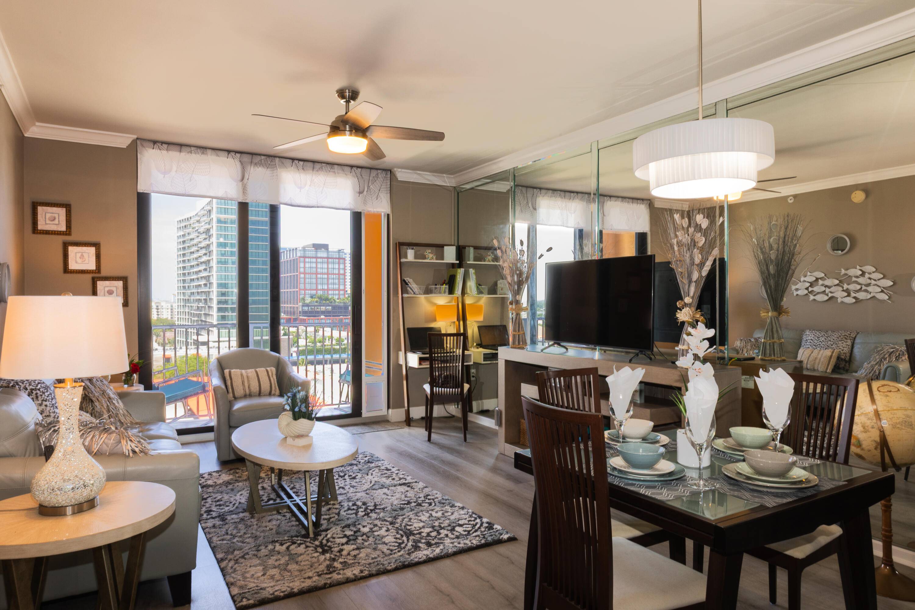 Experience the ultimate live work play lifestyle in this rare penthouse condo in the heart of Downtown West Palm Beach.
