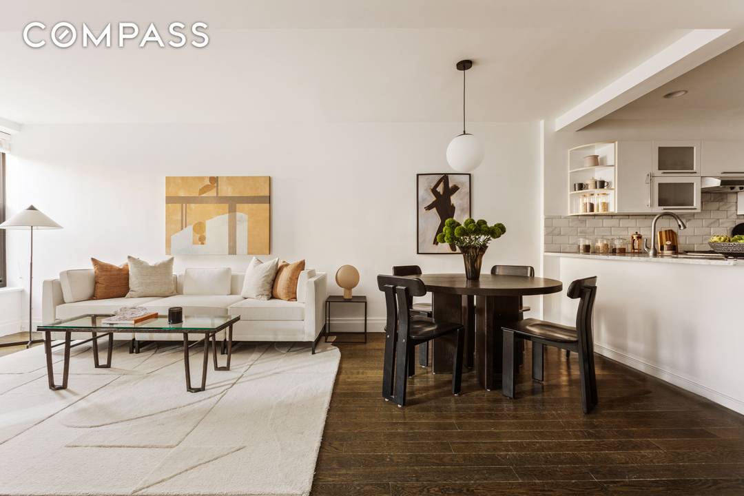 Upgraded and move in ready, this convertible two bedroom, two bathroom residence at The Fitzgerald blends timeless prewar character with thoughtfully curated modern enhancements.